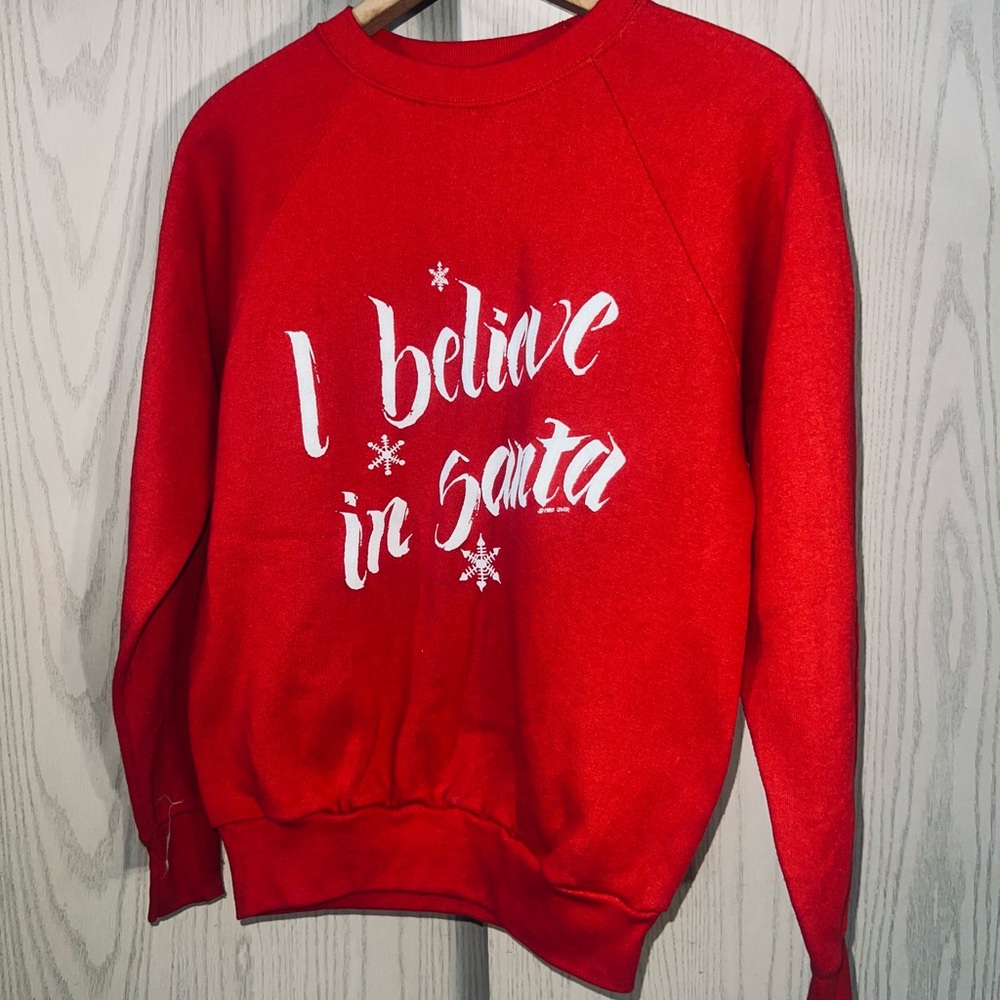 Unisex size medium red 1985 I believe in Santa sweatshirt